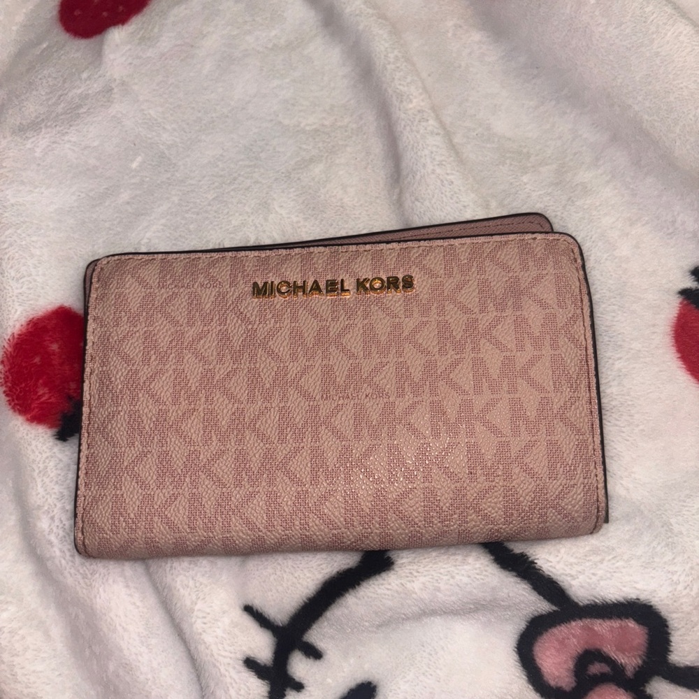 Small MK wallet beat up